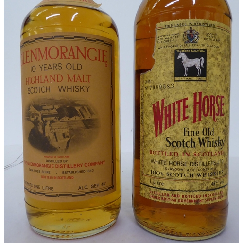 24 - Two bottles of Whisky, viz. a White Horse; and a Glenmorangie