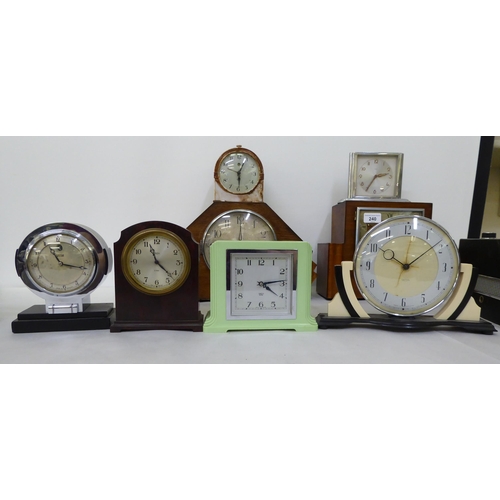 240 - Timepieces/mantel clocks  various makes and styles; and a Roberts radio