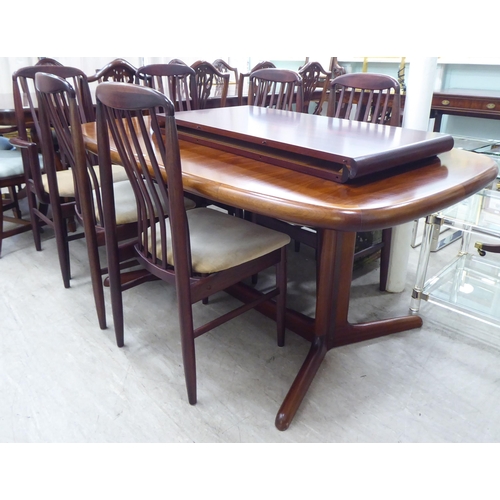 247 - A Skovby mahogany dining table, the oval top on an elongated X-shape underframe  29