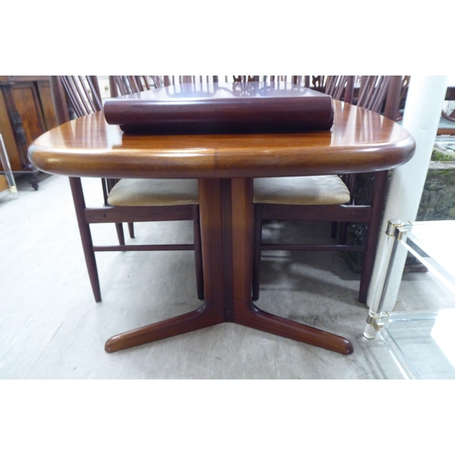 247 - A Skovby mahogany dining table, the oval top on an elongated X-shape underframe  29