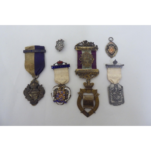 249 - Variously themed medals, mainly Masonic, mostly in silver, some on ribbons  mixed marks