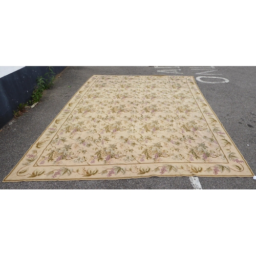 255 - A tapestry panel, decorated with flora, in pastel colours, on a cream ground  108