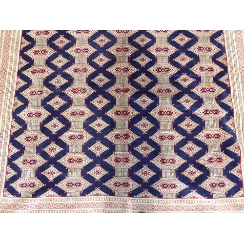 256 - A Bokhara carpet, on a mainly cream coloured ground  88