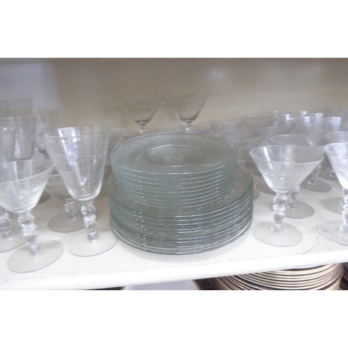 281 - A suite of glassware with foliage decorative banding: to include pedestal wines