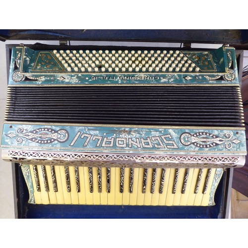 33 - A Scandalli Italian piano accordion, in a fitted carrying case