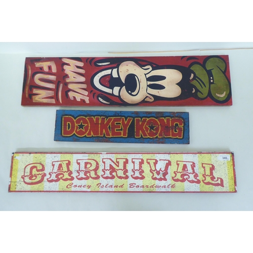 340 - Three modern painted wooden carnival signs  largest 31