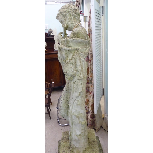 43 - A composition stone classical nude, playing a pipe, standing beside a pillar, on a square plinth&nbs... 