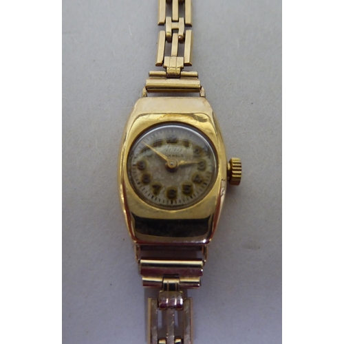 49 - A lady's Avia 9ct gold cased, open chain link bracelet wristwatch, faced by an Arabic dial  cased