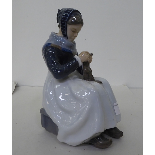 5 - A Royal Copenhagen porcelain figure, a woman knitting  No.1317  7