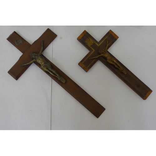 52 - Five similar crucifixes with cast metal Corpus Christi, on wooden stands  largest 16