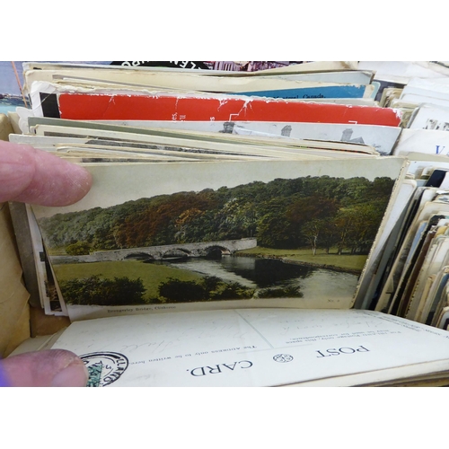 56 - A selection of vintage and later postcards: to include scenic subjects, greetings and others