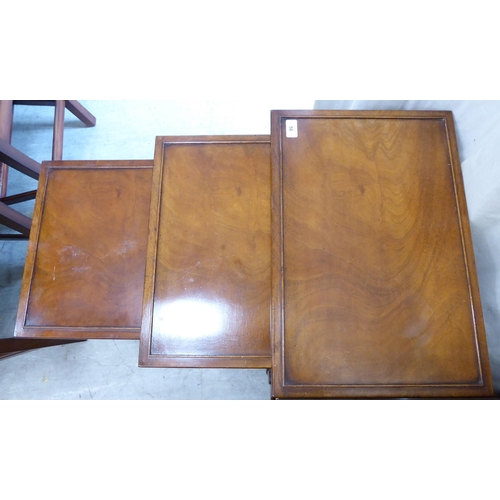 58 - A nesting set of three Titchmarsh & Goodwin 19thC style mahogany finished side tables, the tops ... 