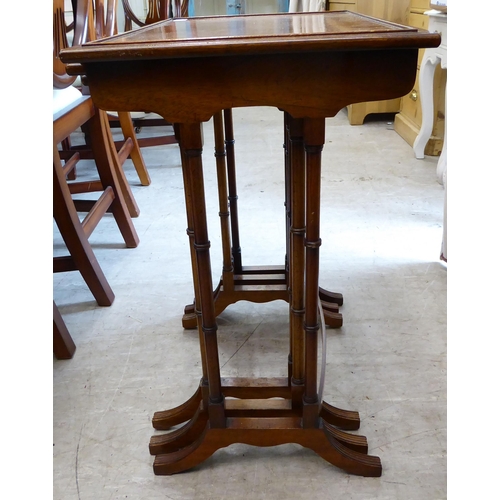 58 - A nesting set of three Titchmarsh & Goodwin 19thC style mahogany finished side tables, the tops ... 