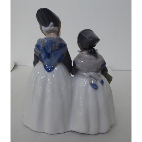 6 - A Royal Copenhagen porcelain group, two Dutch girls, in traditional costume  No.1316  7