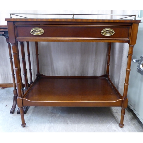 60 - A Re-Furn Heldense Edwardian style mahogany finished serving table with a galleried and string inlai... 