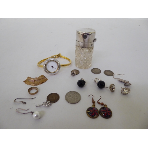 62 - Items of personal ornament: to include a silver mounted, glass scent bottle; and ladies modern wrist... 