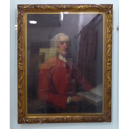 67 - A 19thC half-length portrait of a man wearing a red jacket, reading a book  oil on canvas ... 