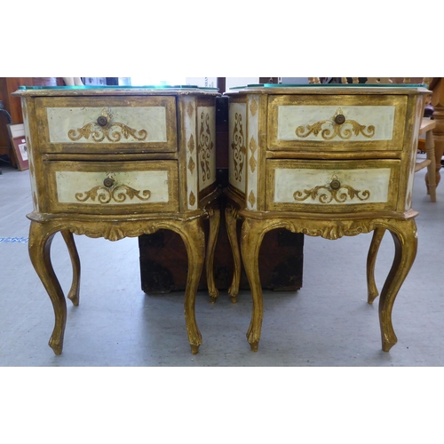 78 - A pair of modern Italian design, cream and gilt painted, two drawer bedside chests, raised on cabrio... 