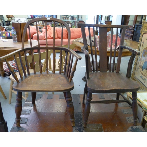 83 - Two similar children's late 19thC elm and ash framed Windsor design chairs, each with a solid seat, ... 