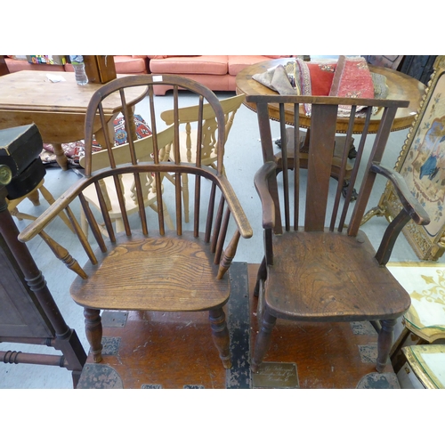 83 - Two similar children's late 19thC elm and ash framed Windsor design chairs, each with a solid seat, ... 