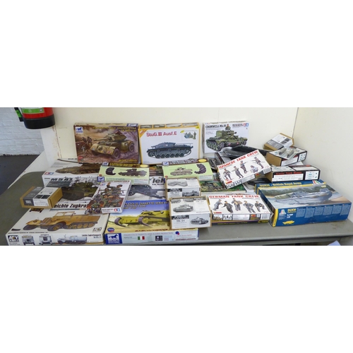 87 - 1/35 scale model kits: to include by Tamiya, a US Self-Propelled 155mm Gun; and a M5A1 Stuart Light ... 