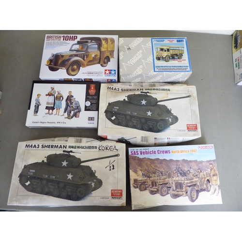 91 - 1/35 scale model kits: to include by Tamiya, a 'Dragon Wagon'; and a First Aid Station by Italeri&nb... 