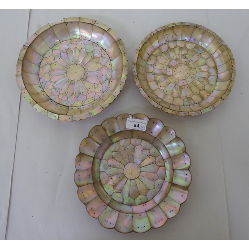 94 - Three similar late 19thC mother-of-pearl dishes  7.5