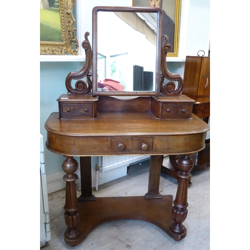 98 - A modern Victorian style Duchess style mahogany dressing table, surmounted by a swing mirror and a p... 