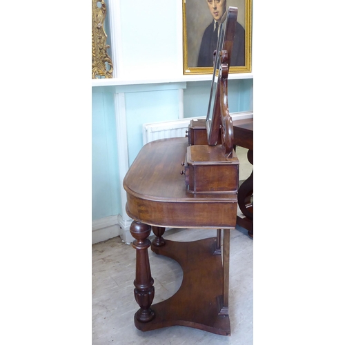 98 - A modern Victorian style Duchess style mahogany dressing table, surmounted by a swing mirror and a p... 