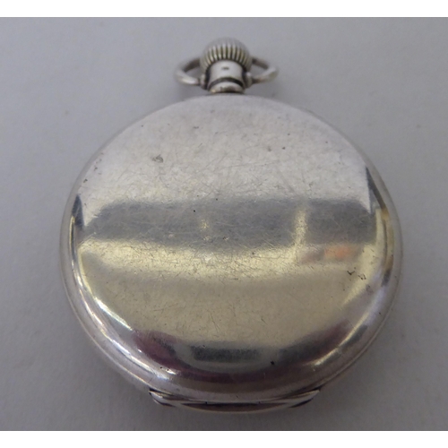 99 - An early 20thC Waltham silver cased pocket watch, the keyless movement faced by a Roman dial, incorp... 