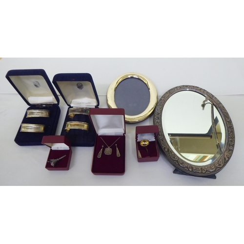 257 - Collectables: to include two pairs of silver presentation napkin rings  mixed marks  boxed