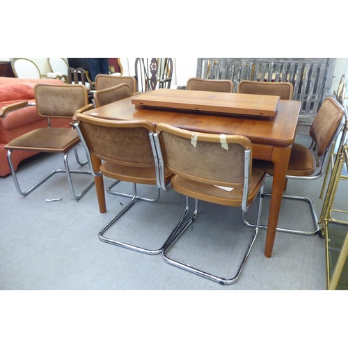 291 - A Heal & Son Ltd teak dining table, raised on turned, straight, tapered legs  29