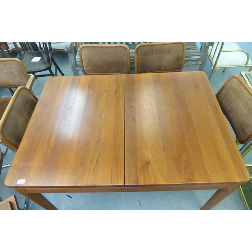 291 - A Heal & Son Ltd teak dining table, raised on turned, straight, tapered legs  29