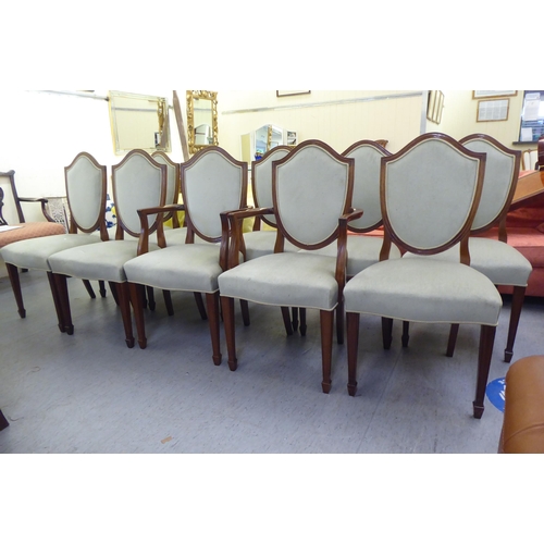 307 - A set of ten modern Sheraton design mahogany framed dining chairs with upholstered backs, pads ands ... 