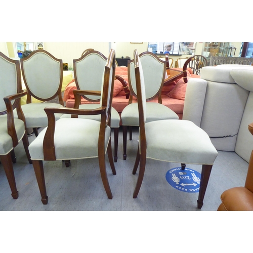 307 - A set of ten modern Sheraton design mahogany framed dining chairs with upholstered backs, pads ands ... 