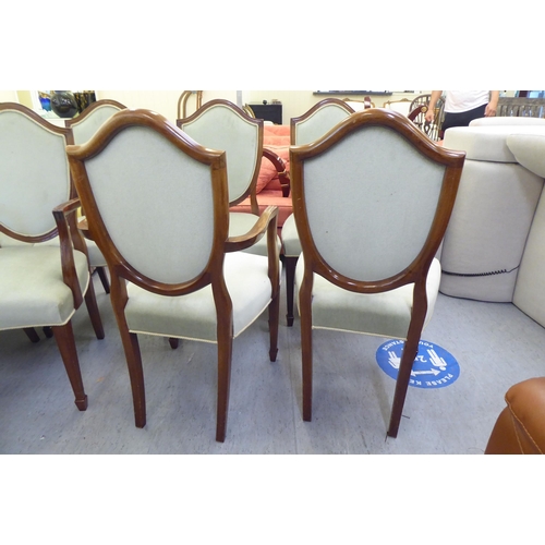 307 - A set of ten modern Sheraton design mahogany framed dining chairs with upholstered backs, pads ands ... 