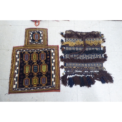 321 - Rugs, saddle bags and textiles: to include a Persian bag  32