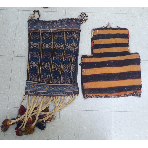 321 - Rugs, saddle bags and textiles: to include a Persian bag  32