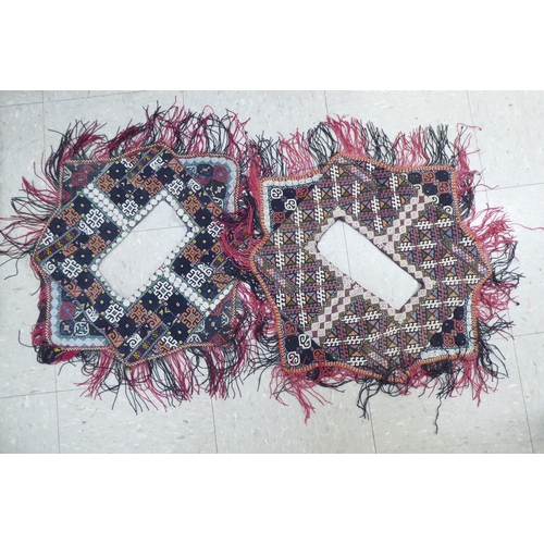 321 - Rugs, saddle bags and textiles: to include a Persian bag  32