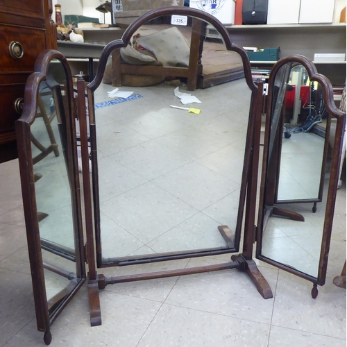 335 - Furniture: to include a 20thC Queen Anne style, mahogany finished triptych dressing mirror  31