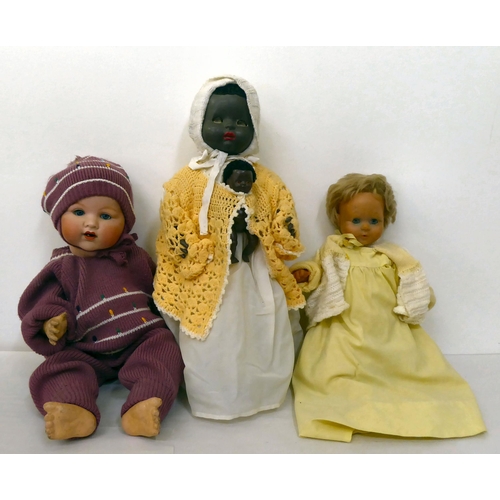 288 - Three 20thC dolls, viz. one with a composition body; one rubberised; and an Armand Marseille bisque ... 