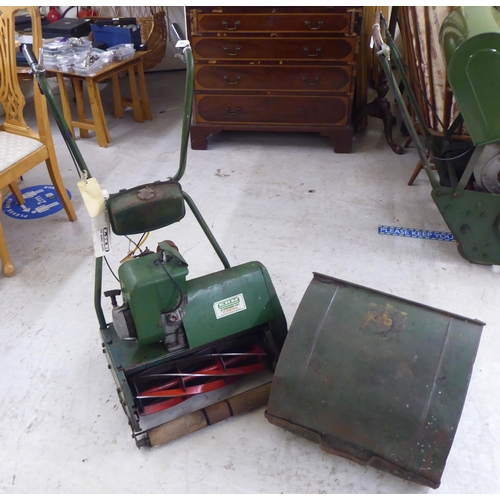 100 - A vintage KHM petrol driven lawnmower with a 16