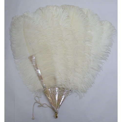 108 - Vintage garments and accessories: to include a mother-of-pearl handled fan  boxed