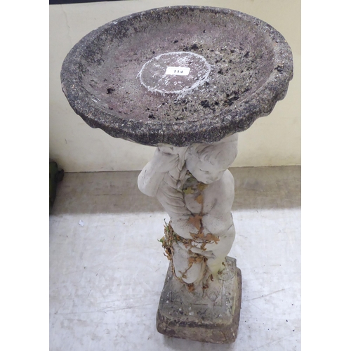 114 - A composition stone two-part pedestal bird bath, the column fashioned as a young boy, on a plinth&nb... 