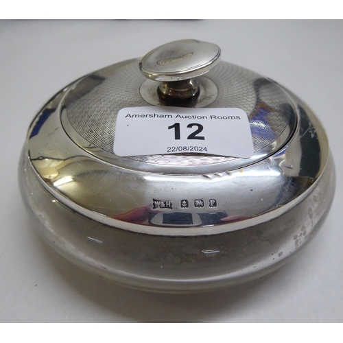 12 - Silver collectables: to include a Walker & Hall silver lidded clear glass powder jar  Birmingham... 