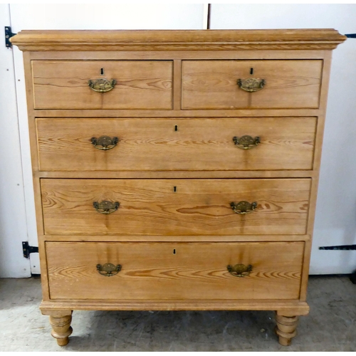 125 - An early 20thC pine five drawer dressing chest, raised on turned legs  42