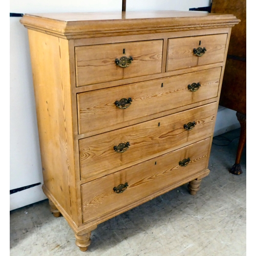 125 - An early 20thC pine five drawer dressing chest, raised on turned legs  42