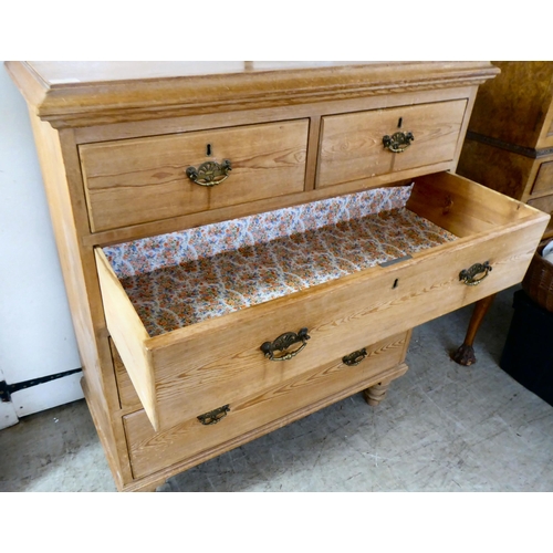 125 - An early 20thC pine five drawer dressing chest, raised on turned legs  42