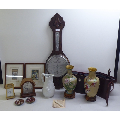 145 - A mixed lot: to include a 1930s oak barometer with a silvered dial  31