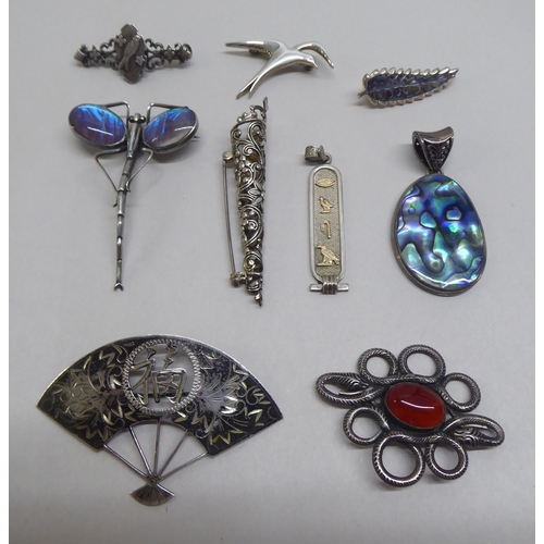 148 - Silver and white metal jewellery: to include a brooch, fashioned as a dragonfly